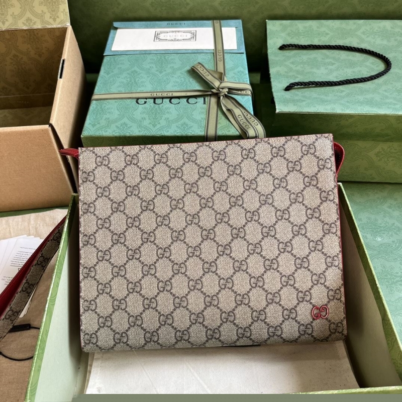 G*u*i clutch bags